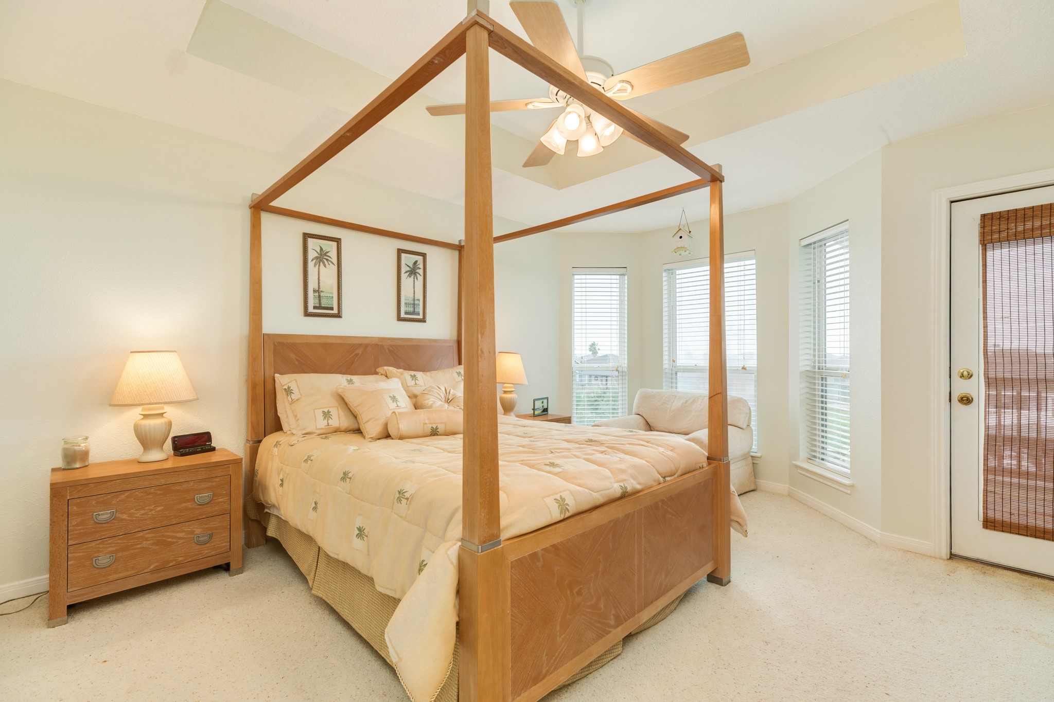 139 Driftwood Road Freeport, TX 77541 - Photo 22 of 34 a bedroom with a bed a large mirror and a walk in closet