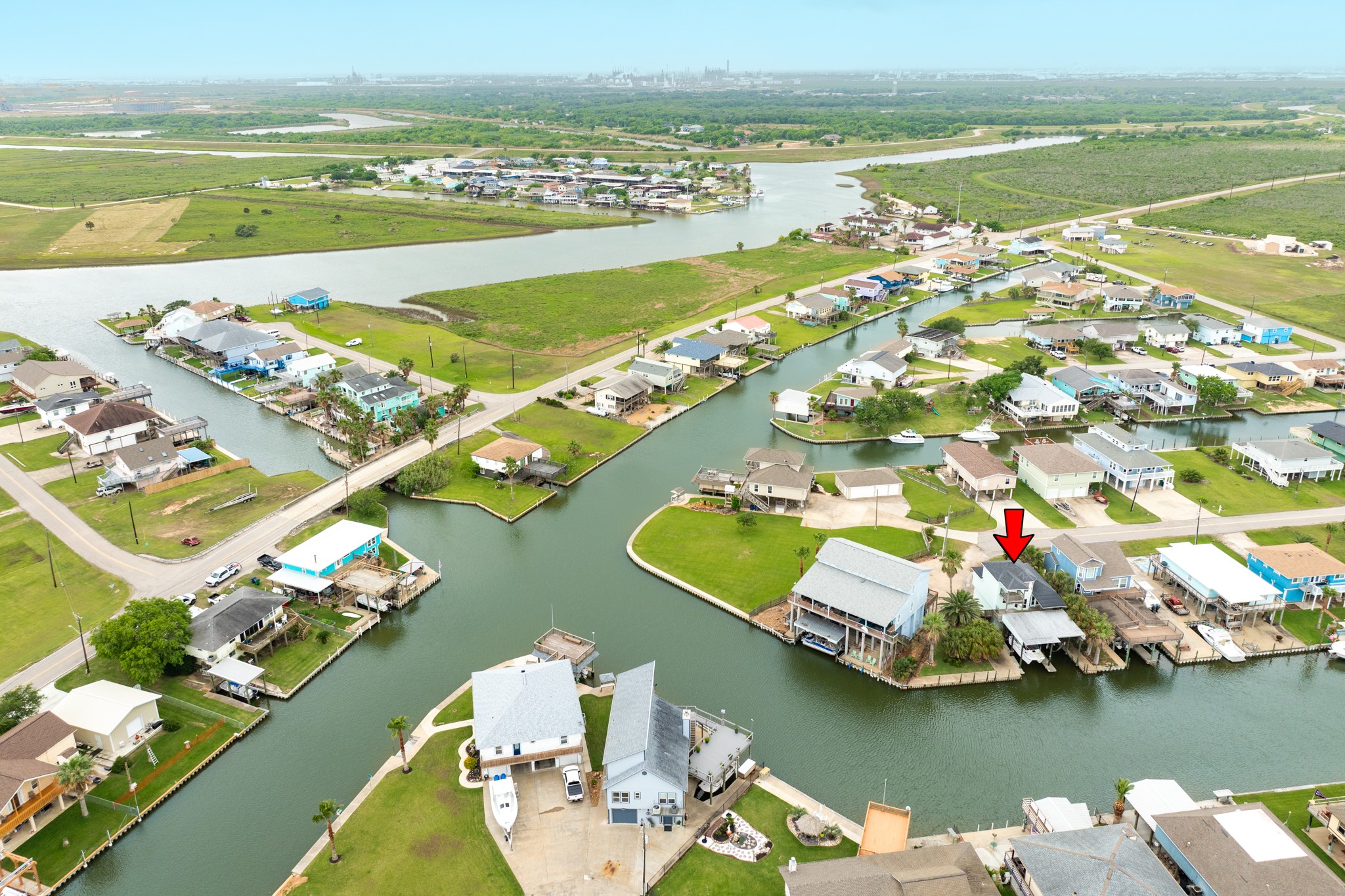 139 Driftwood Road Freeport, TX 77541 - Photo 3 of 34 an aerial view of residential houses with outdoor space and lake view