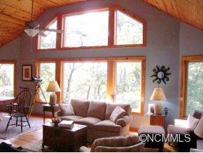 181 Caledonia Road Landrum, SC 29356 - Photo 3 of 24 a living room with furniture and a large window