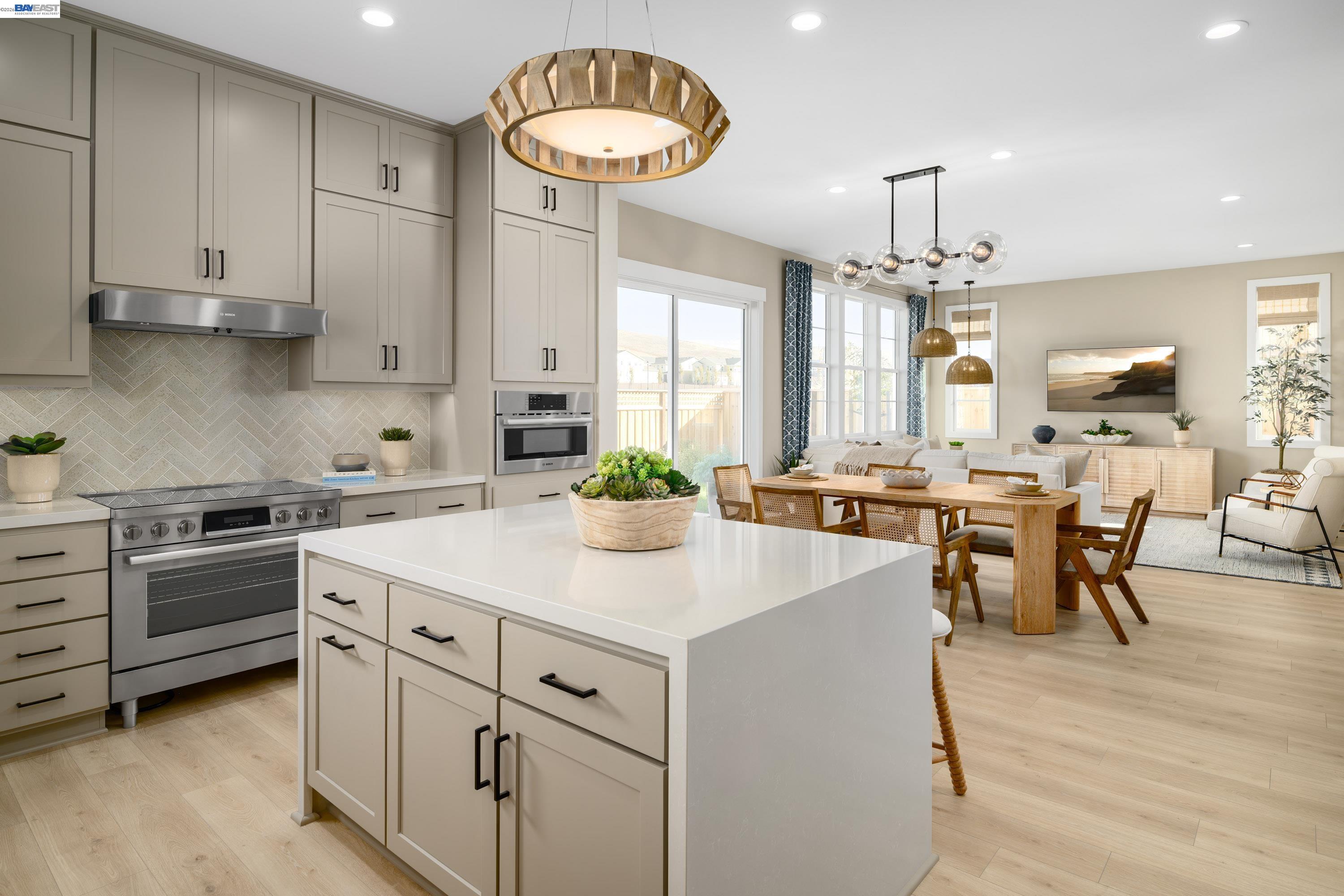 3820 Hereford Road Dublin, CA 94568 - Photo 16 of 22 a kitchen with cabinets appliances and a table