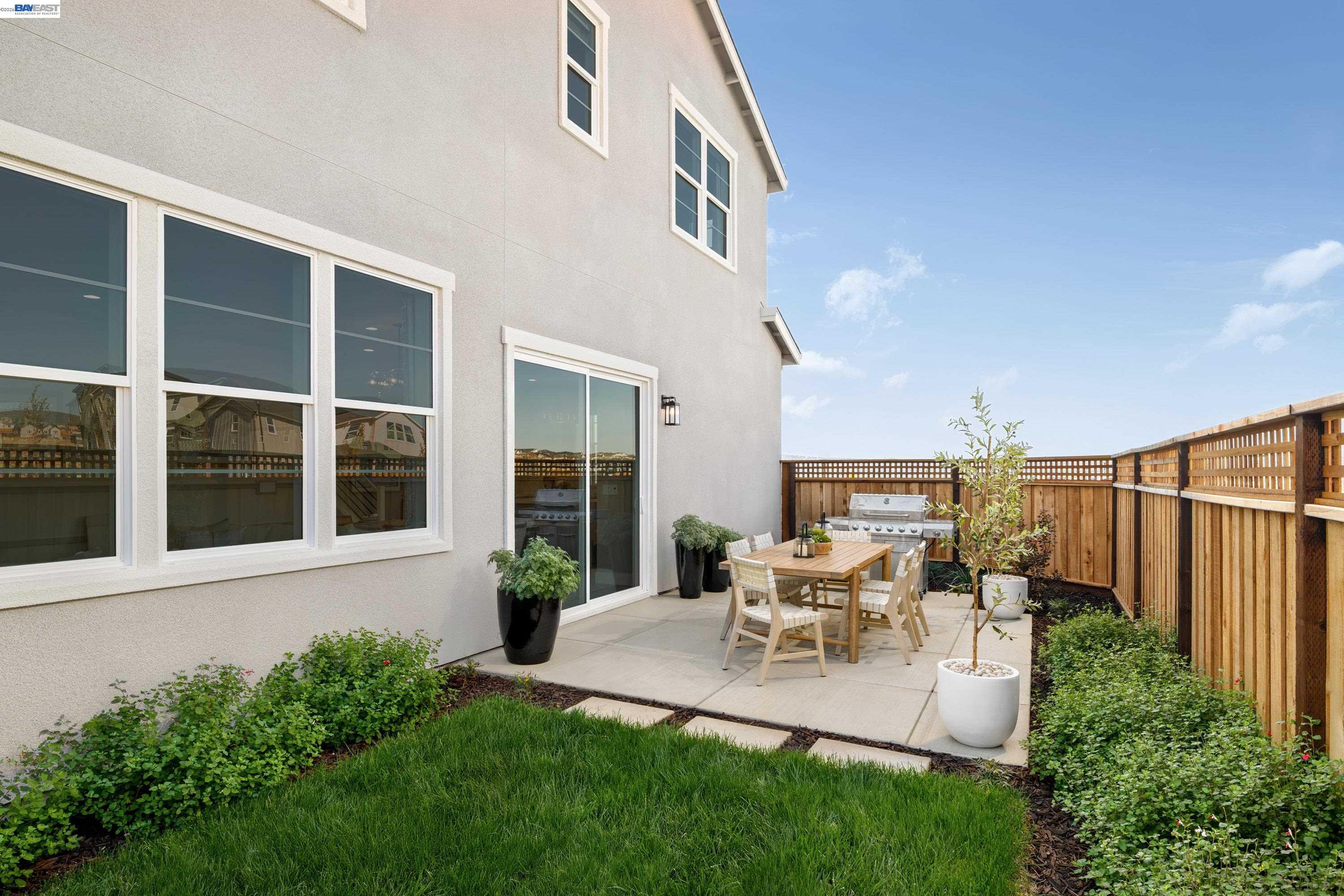 3820 Hereford Road Dublin, CA 94568 - Photo 7 of 22 a view of backyard of house with outdoor seating and green space