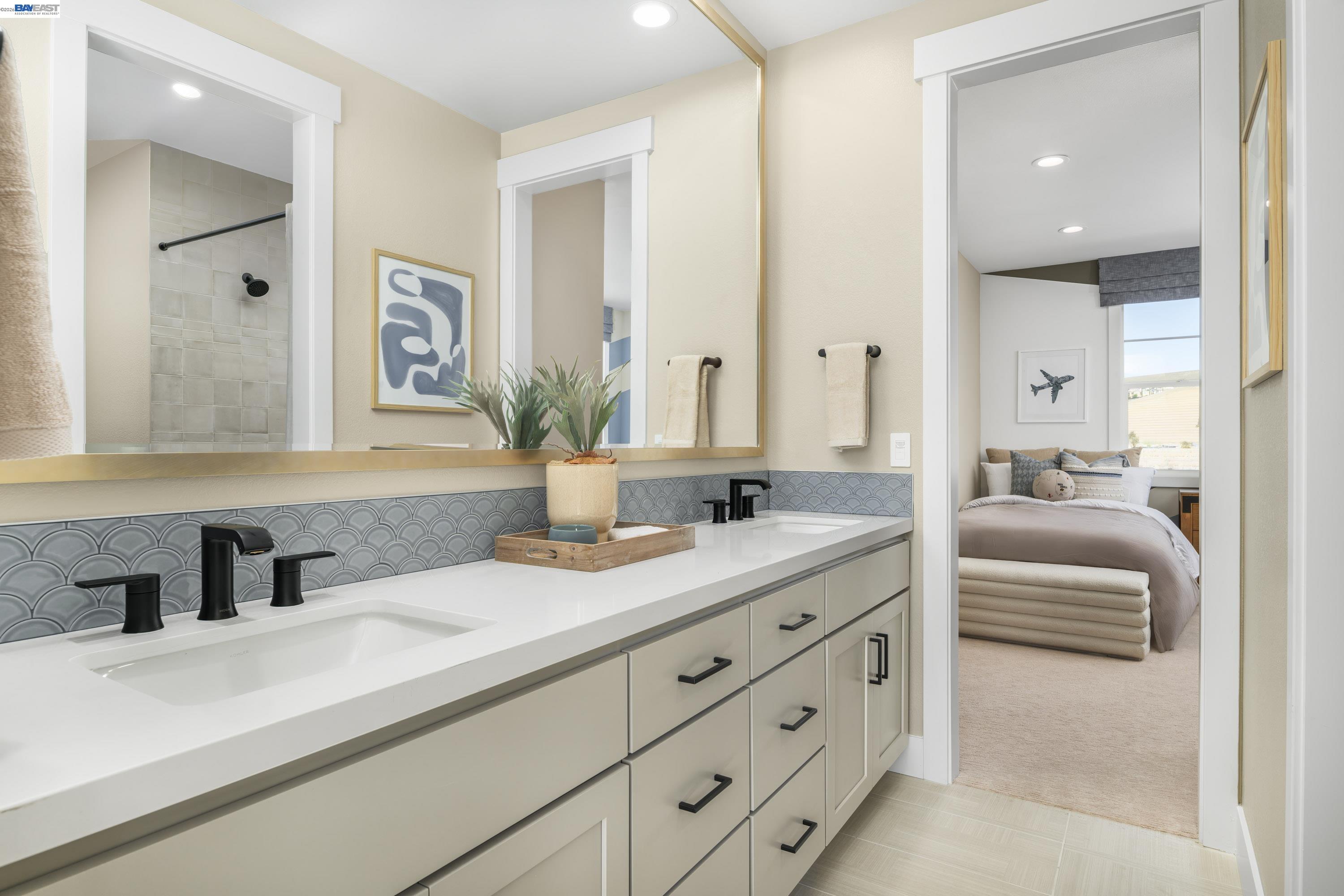 3820 Hereford Road Dublin, CA 94568 - Photo 10 of 22 a en suite bathroom with double sink and a mirror
