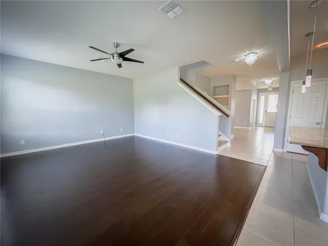 a room with a table and chairs