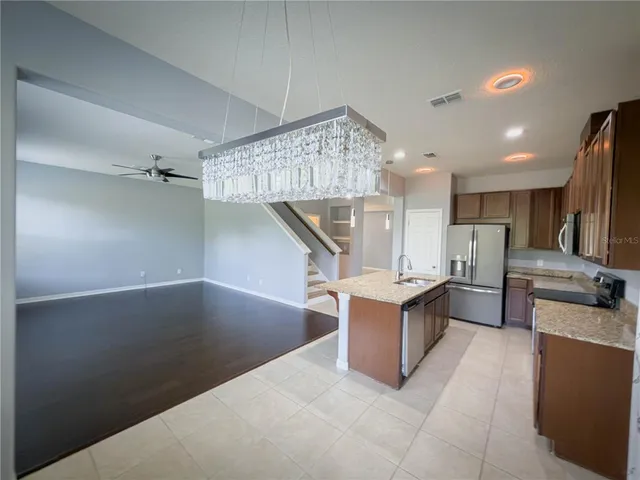 a view of a storage & utility room with windows