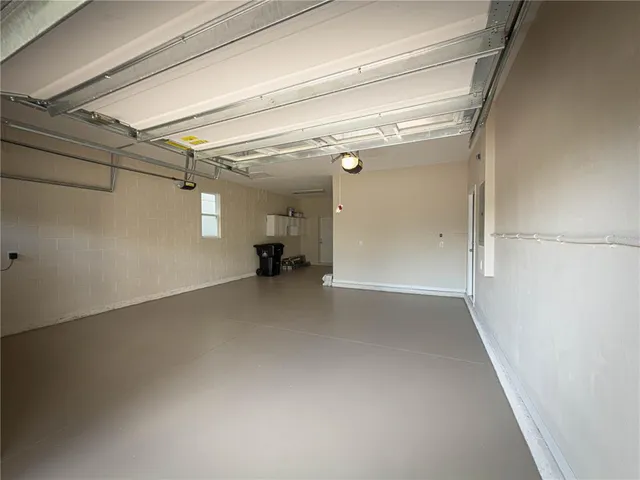 a view of a swimming pool with a yard