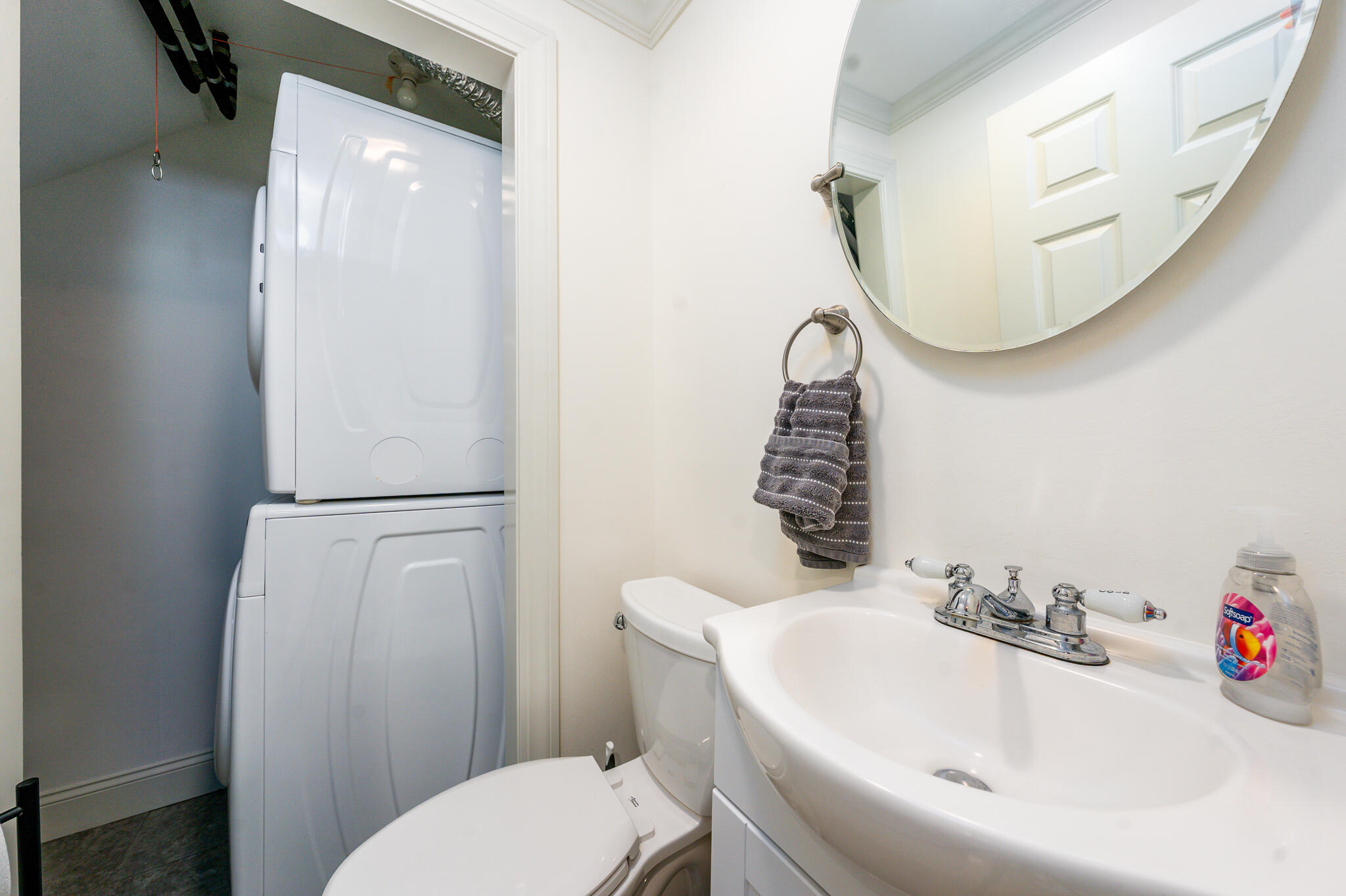 135 West Main Street, Unit 45 Hyannis, MA 02601 - Photo 13 of 23 a bathroom with a sink a toilet and a mirror