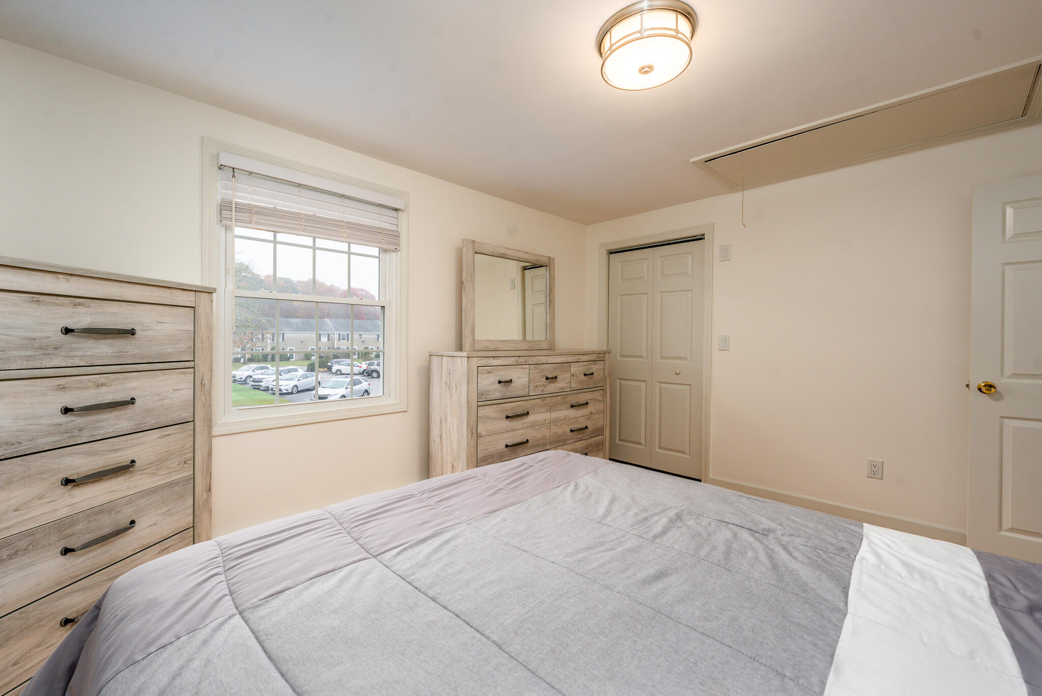 135 West Main Street, Unit 45 Hyannis, MA 02601 - Photo 17 of 23 a bedroom with a bed and a window