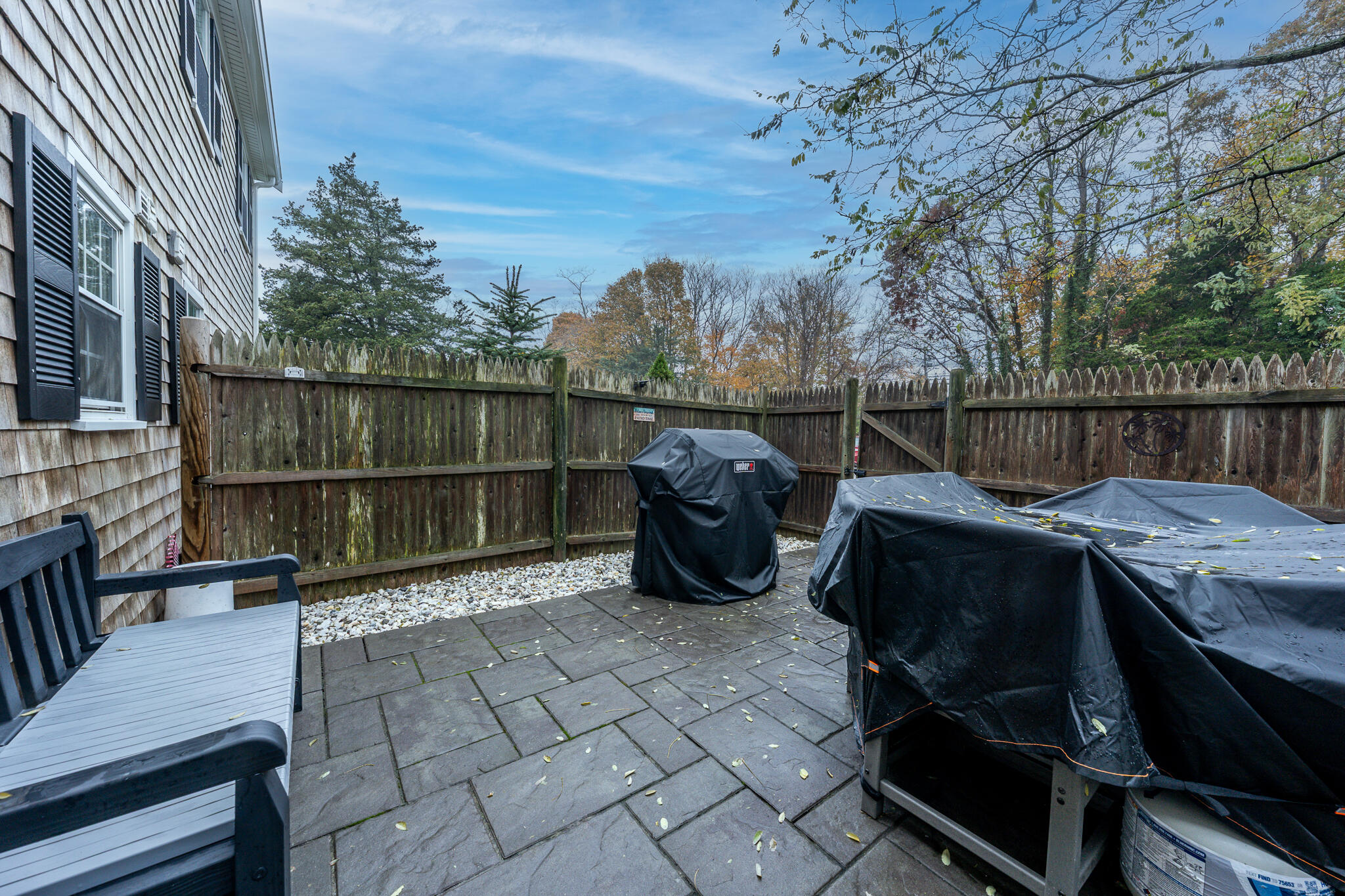 135 West Main Street, Unit 45 Hyannis, MA 02601 - Photo 20 of 23 a view of a roof deck with couches and wooden floor