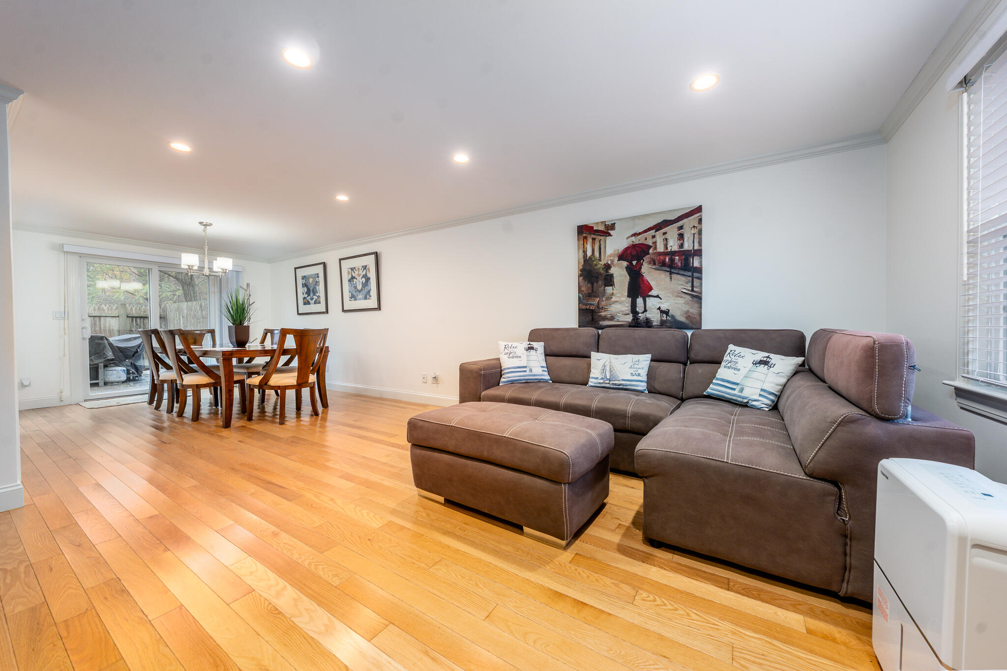 135 West Main Street, Unit 45 Hyannis, MA 02601 - Photo 2 of 23 a living room with furniture and kitchen view