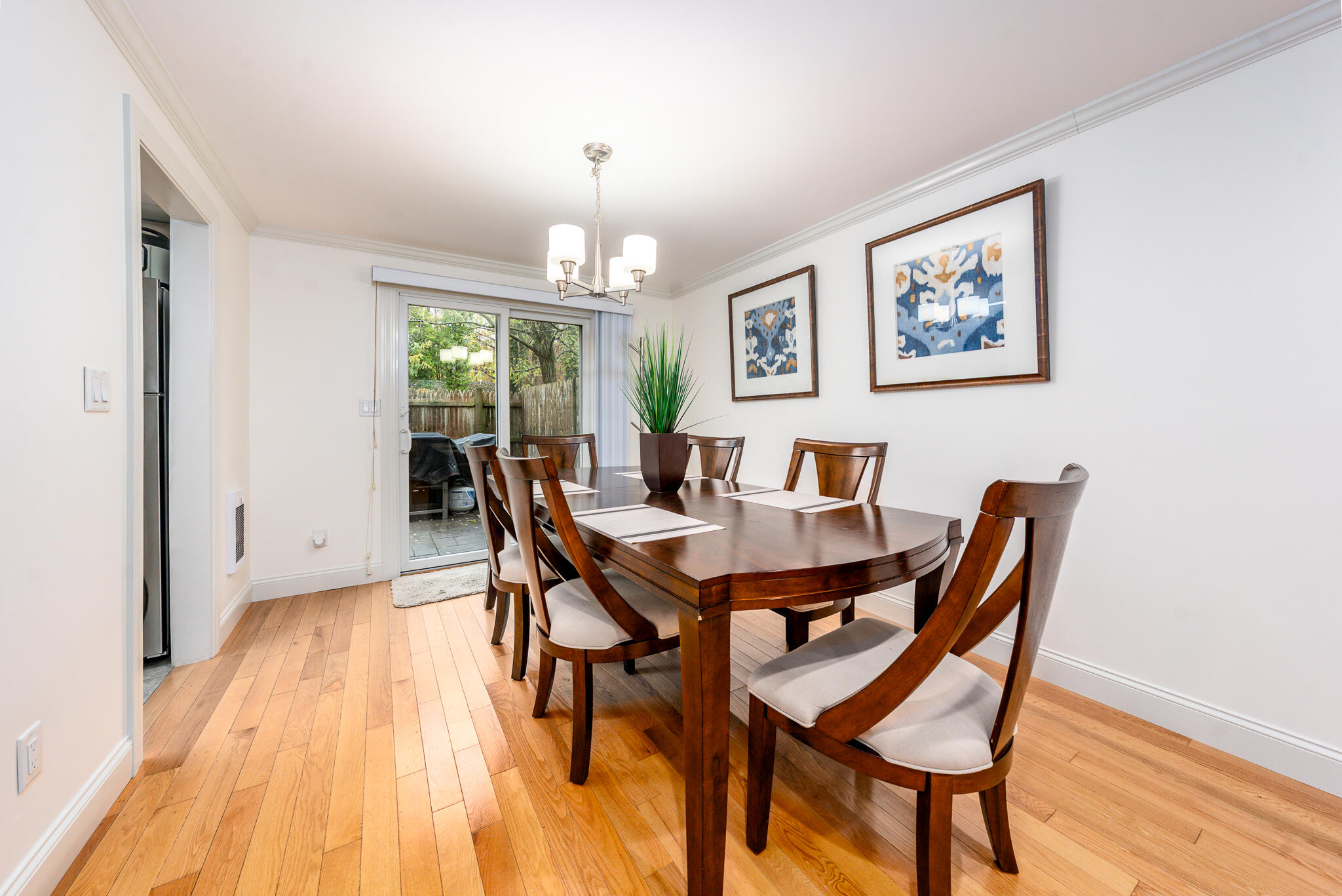 135 West Main Street, Unit 45 Hyannis, MA 02601 - Photo 7 of 23 a view of a dining room with furniture window and wooden floor