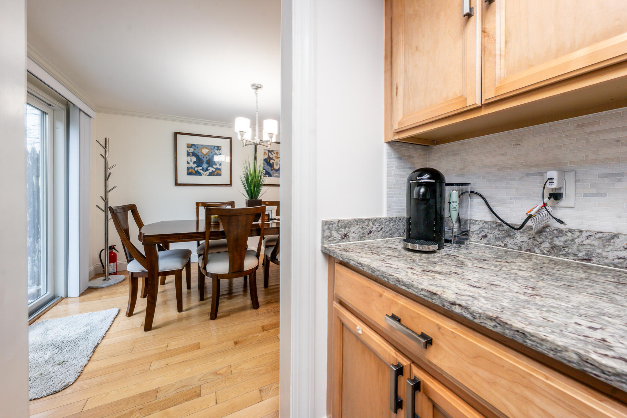 135 West Main Street, Unit 45 Hyannis, MA 02601 - Photo 10 of 23 a view of dining table chairs and entryway