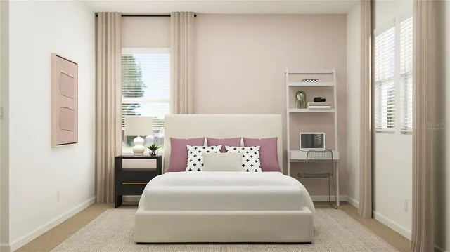 a bedroom with a bed and window