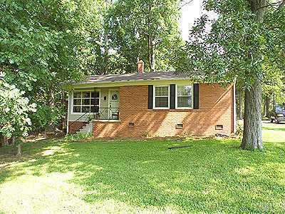 2343 Kennington Road Raleigh, NC 27610 - Photo 1 of 1 a view of a house with a yard and sitting area