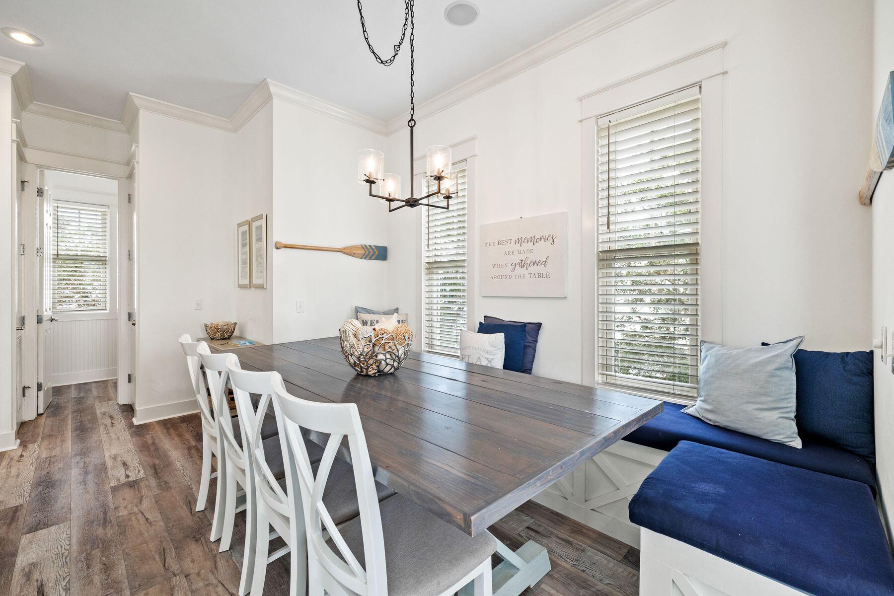 48 Chelsea Loop Road Santa Rosa Beach, FL 32459 - Photo 17 of 37 a view of a dining room with furniture window and wooden floor