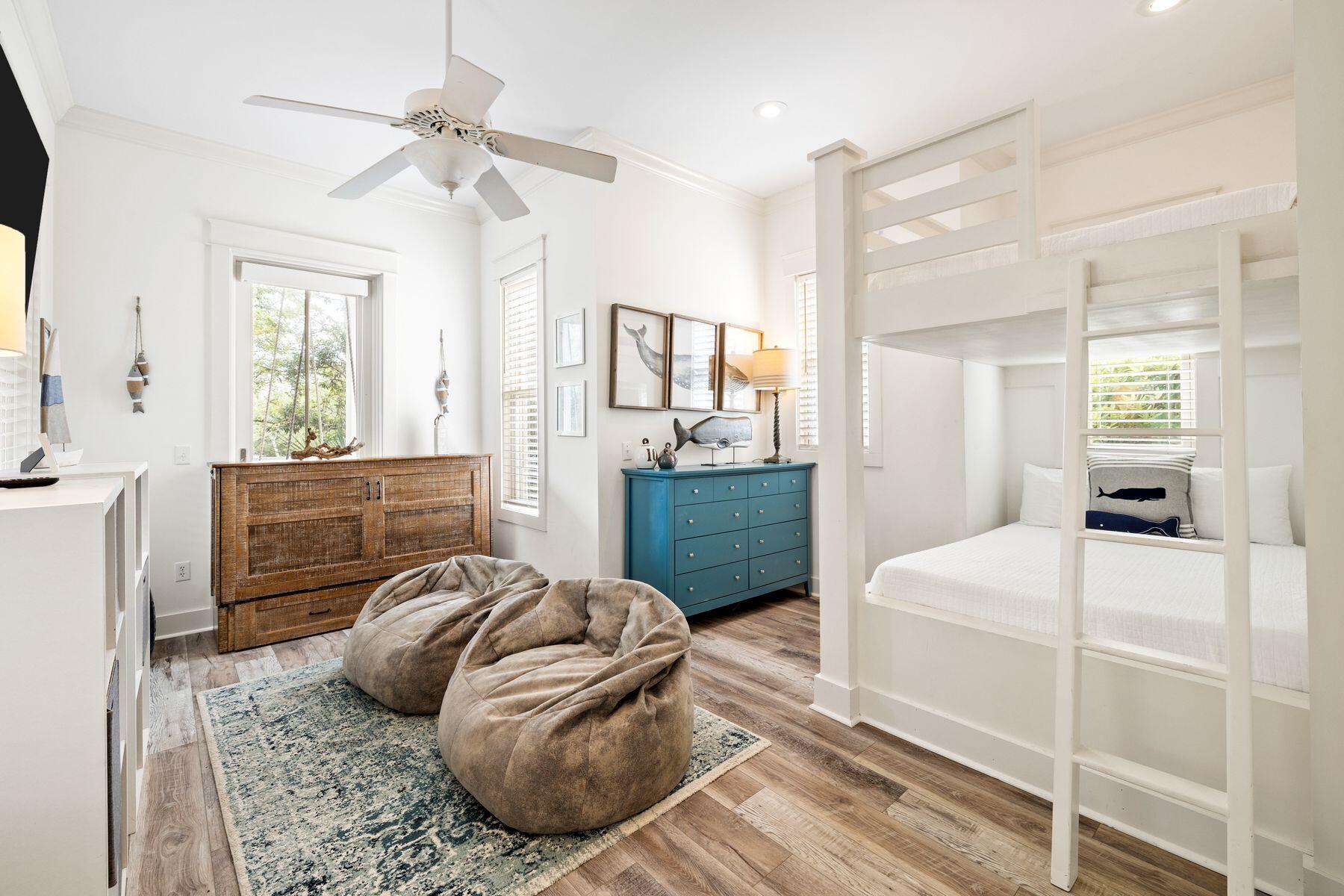 48 Chelsea Loop Road Santa Rosa Beach, FL 32459 - Photo 18 of 37 a room with a bed and a mirror