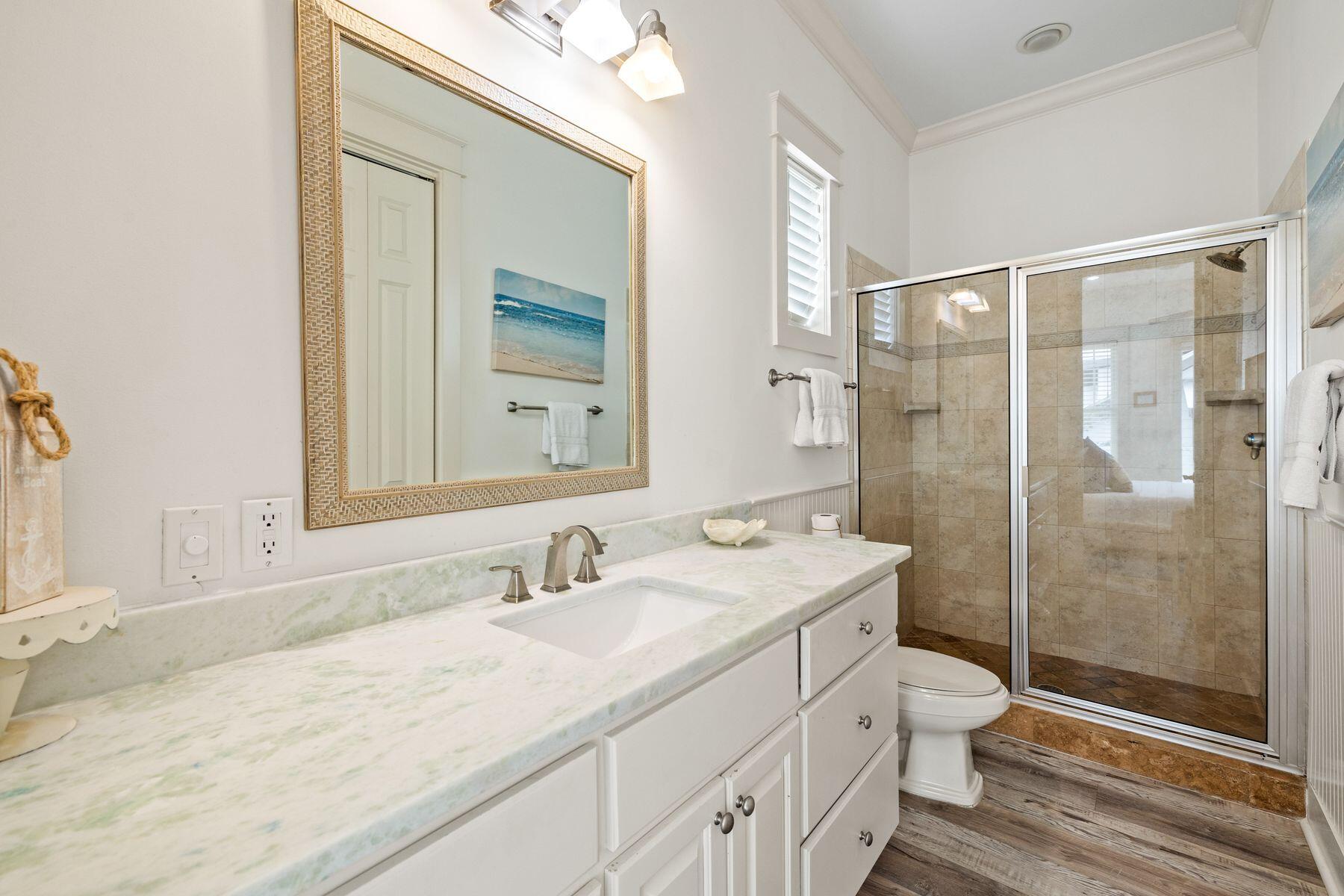 48 Chelsea Loop Road Santa Rosa Beach, FL 32459 - Photo 24 of 37 a bathroom with a granite countertop sink toilet and shower