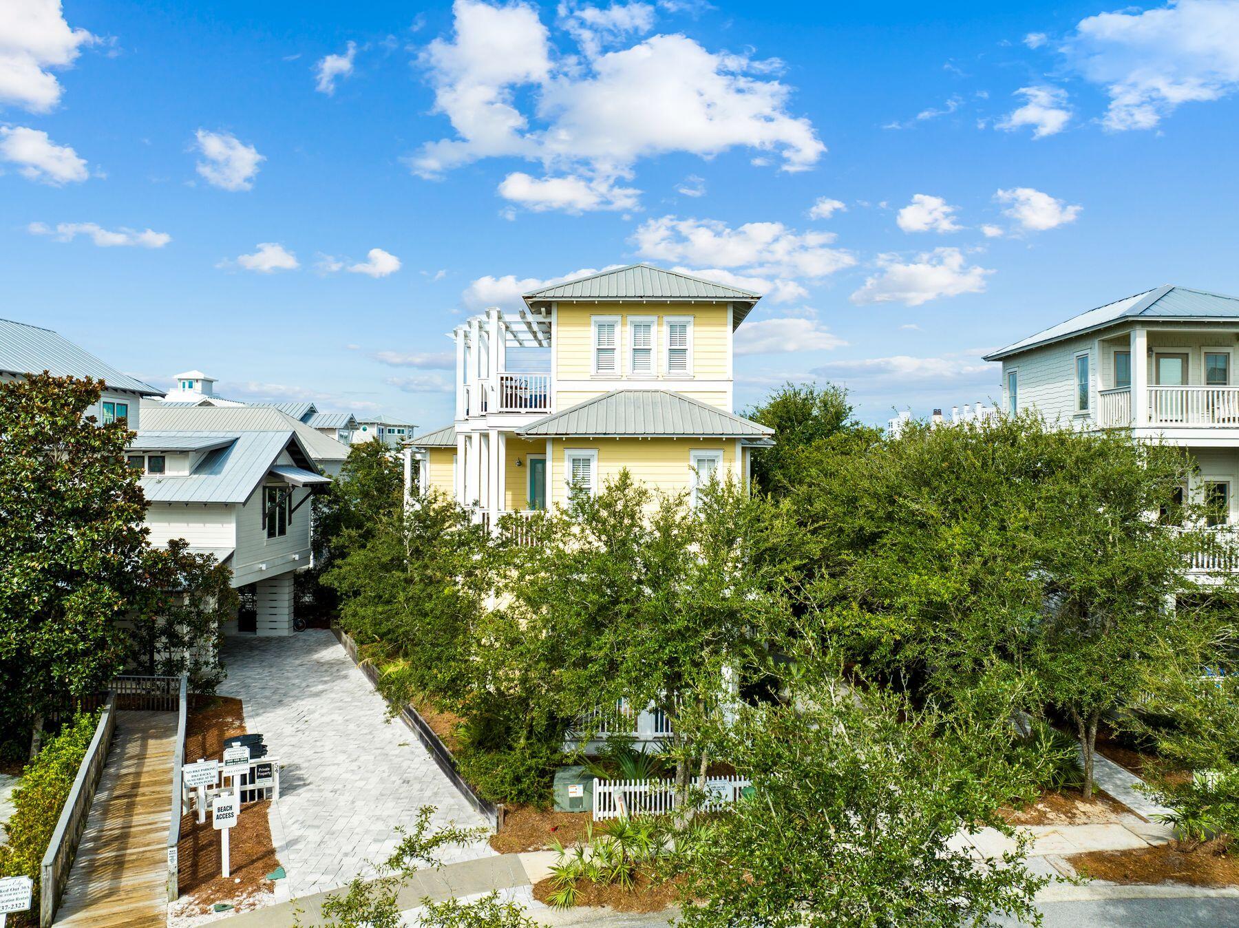 48 Chelsea Loop Road Santa Rosa Beach, FL 32459 - Photo 7 of 37 a front view of a house with garden