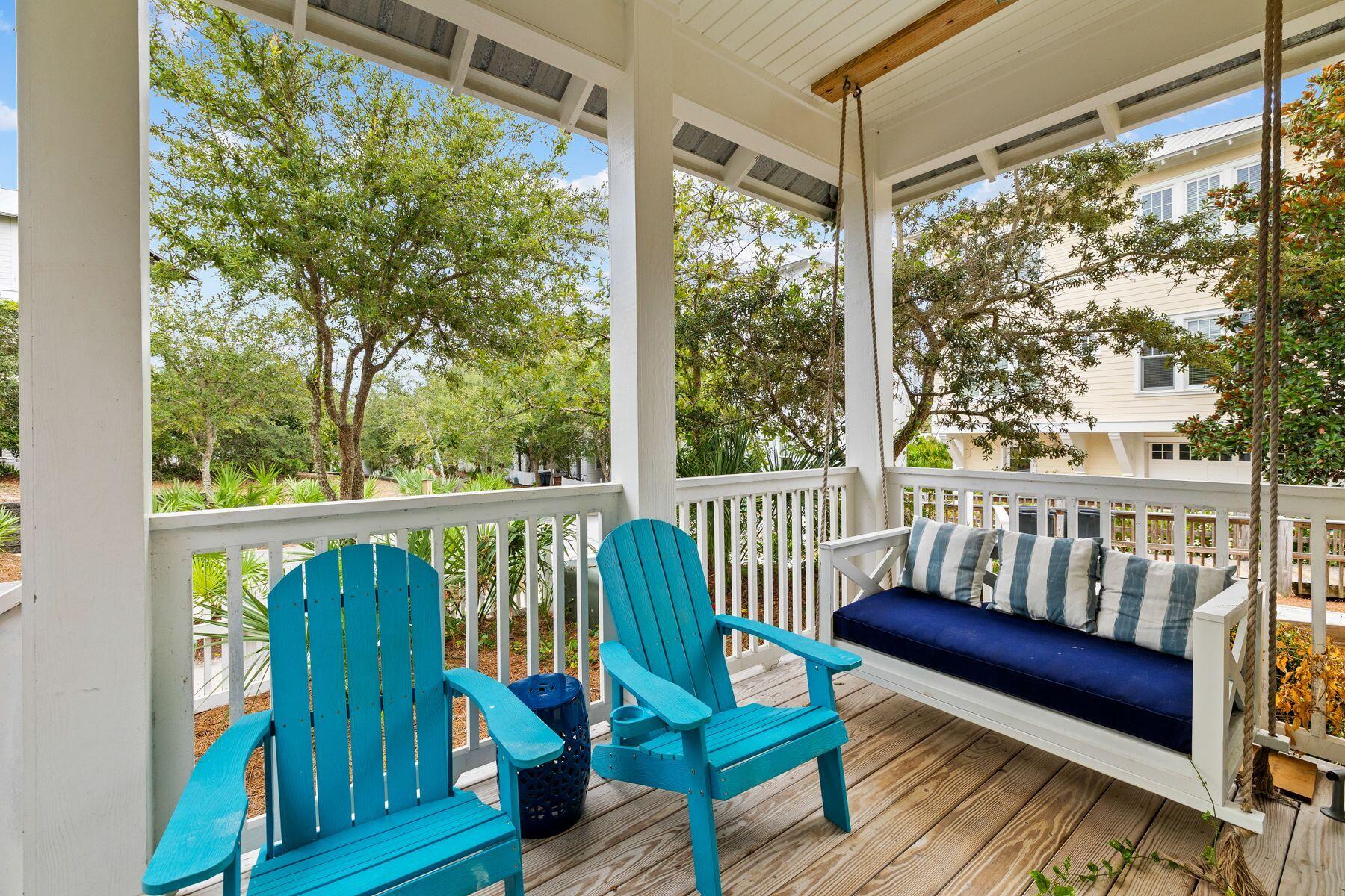48 Chelsea Loop Road Santa Rosa Beach, FL 32459 - Photo 9 of 37 a view of a two chairs in the deck