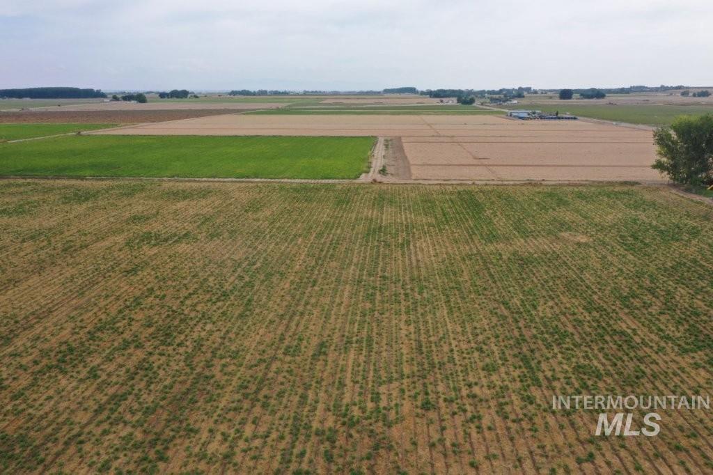 Tbd Upper Pleasant Ridge Road Wilder, ID 83676 - Photo 3 of 3 Aerial view of sparsely populated area with rows of crops