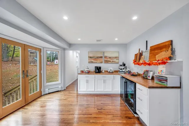 a kitchen with stainless steel appliances granite countertop a stove top oven