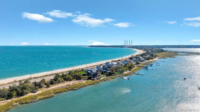 a view of a golf course with a lake
