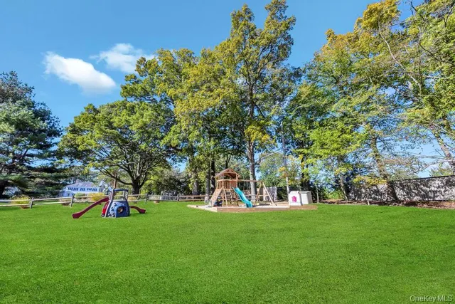 a view of a park with houses
