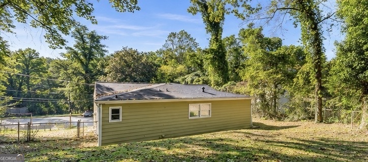 477 Fairlane Circle Northwest Atlanta, GA 30331 - Photo 7 of 7 a view of a house with a yard