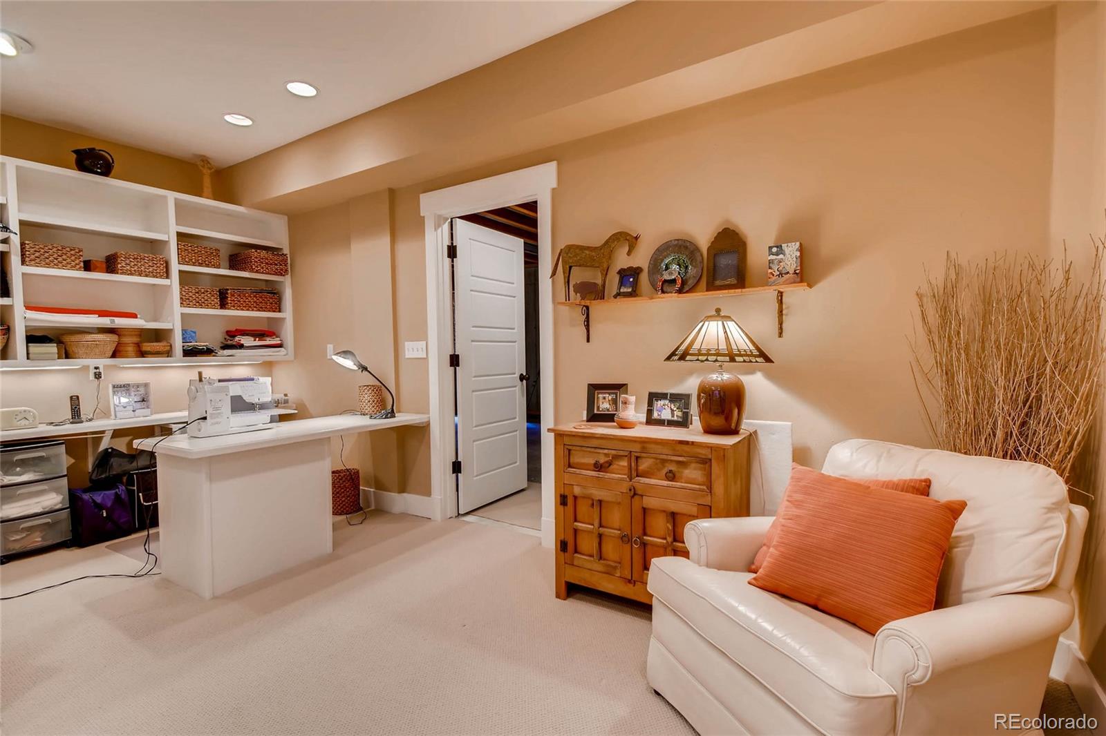 11770 Perry Street Westminster, CO 80031 - Photo 24 of 28 a living room with furniture and window