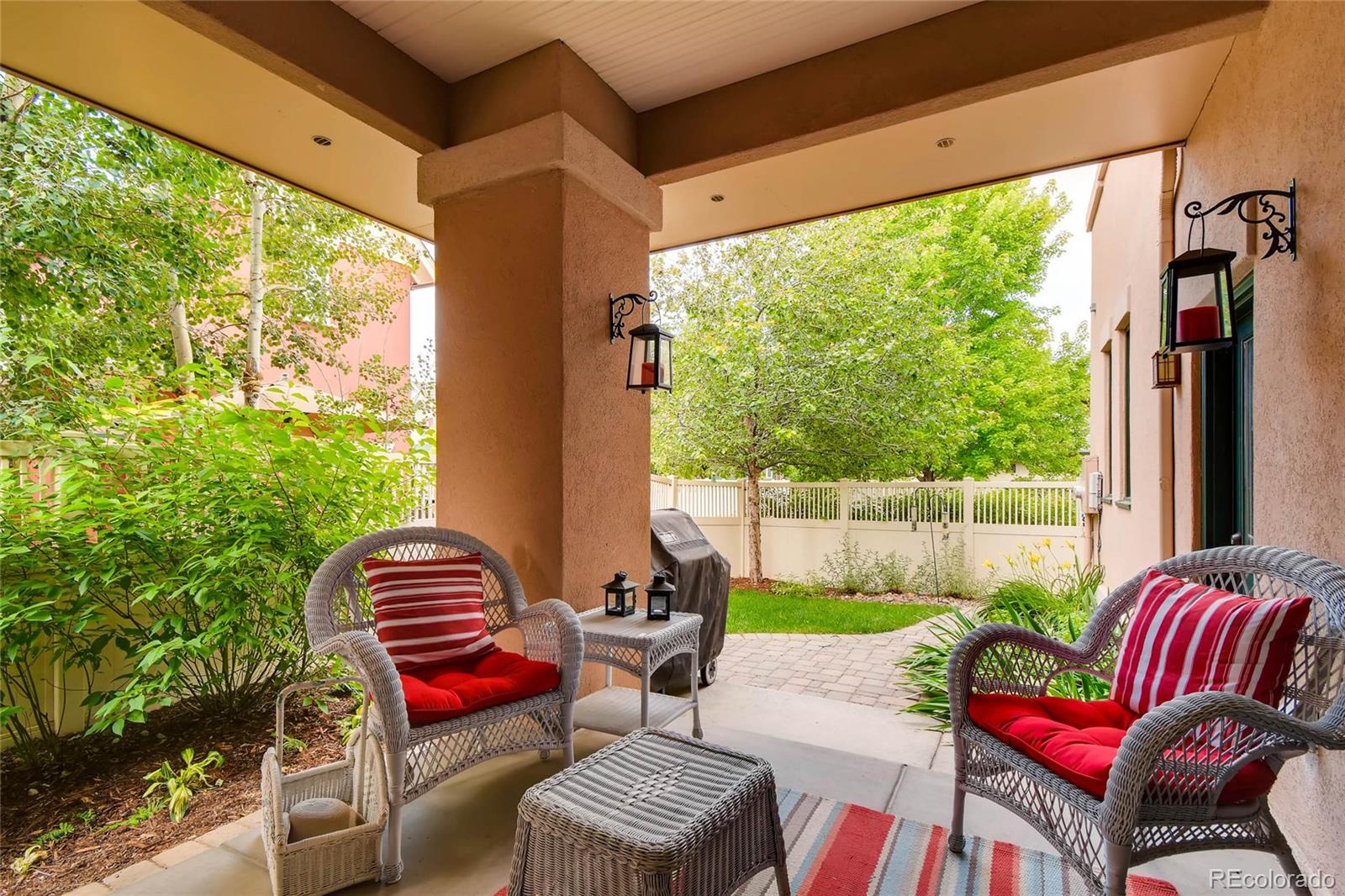 11770 Perry Street Westminster, CO 80031 - Photo 25 of 28 a balcony with furniture and a garden