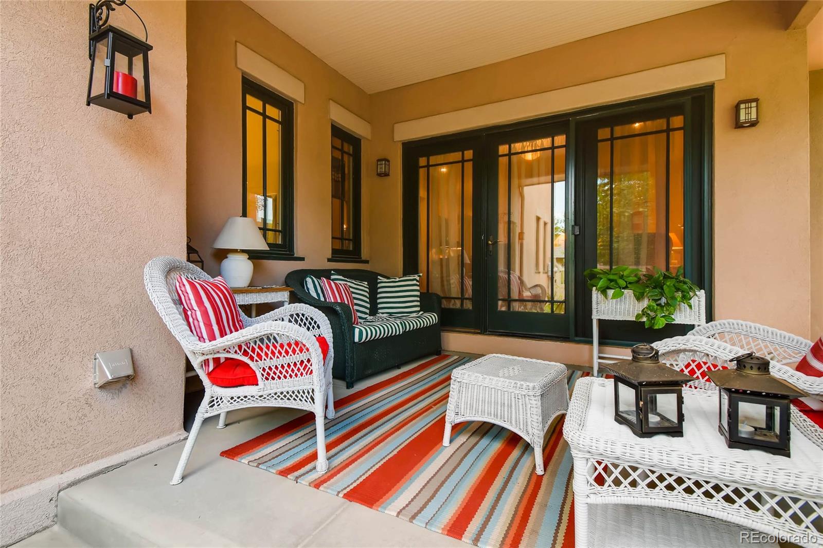 11770 Perry Street Westminster, CO 80031 - Photo 26 of 28 a living room with furniture and a potted plant