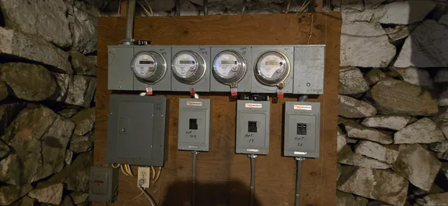 a close view of meter board on wall