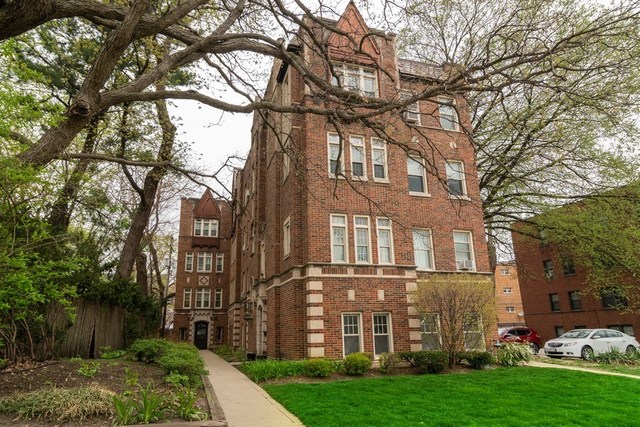 72 Pine Avenue, Unit GDN Riverside, IL 60546 - Photo 1 of 10 front view of a building with a yard