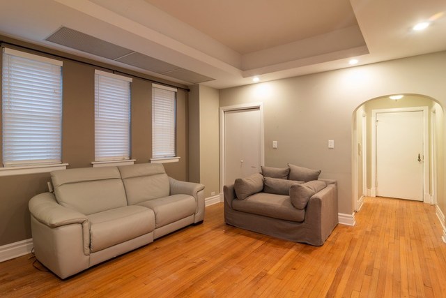 72 Pine Avenue, Unit GDN Riverside, IL 60546 - Photo 2 of 10 a living room with furniture and a large window