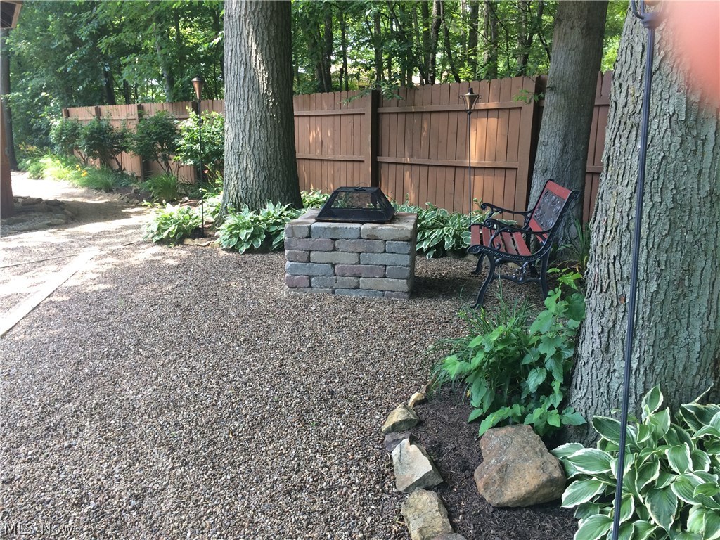 6739 Stoney Ridge Road North Ridgeville, OH 44039 - Photo 16 of 32 View of beautiful fire pit area and custom stone work.