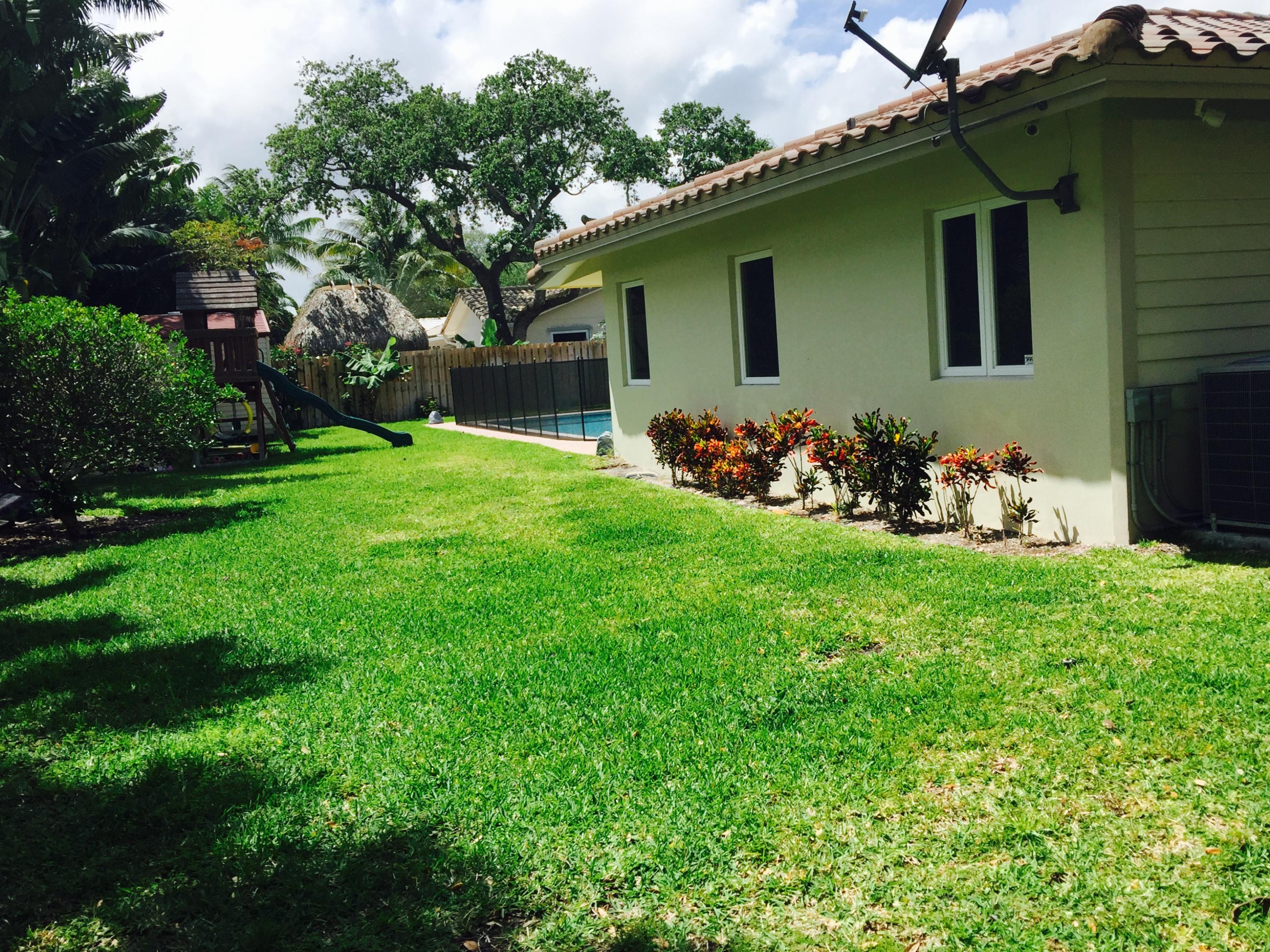 1246 Southwest 13th Place Boca Raton, FL 33486 - Photo 36 of 37 Outside-Back1