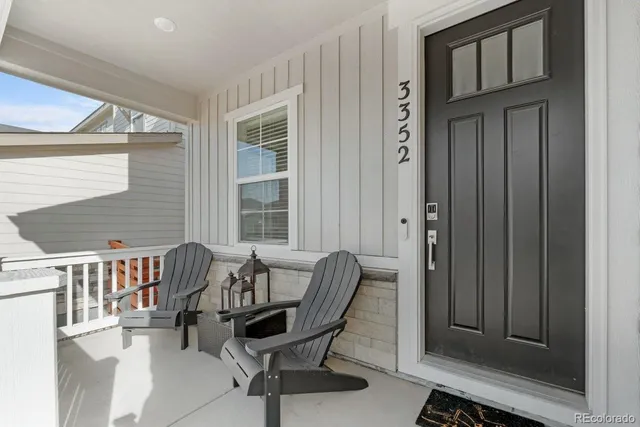 a view of a chair and table in the balcony