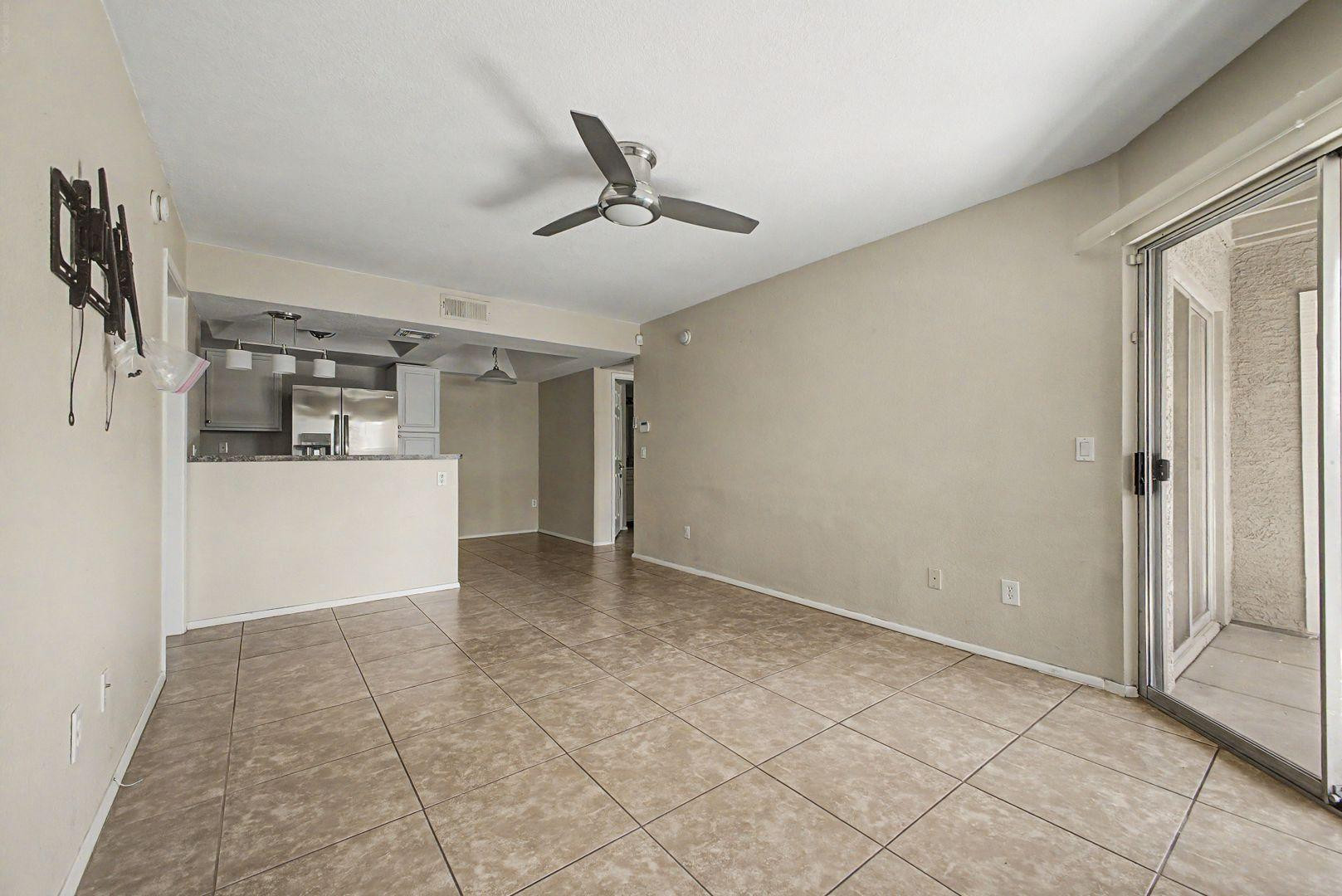 1720 East Thunderbird Road, Unit 1086 Phoenix, AZ 85022 - Photo 3 of 32 a view of a kitchen with a refrigerator and a refrigerator