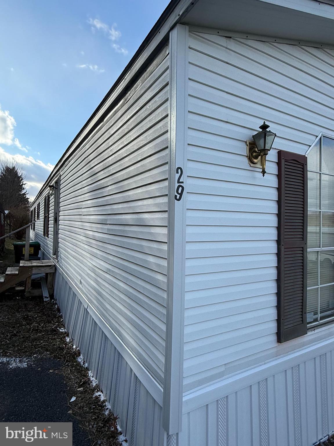 501 Windy Hill Road Shermans Dale, PA 17090 - Photo 2 of 13 a view of a back yard and the wooden wall