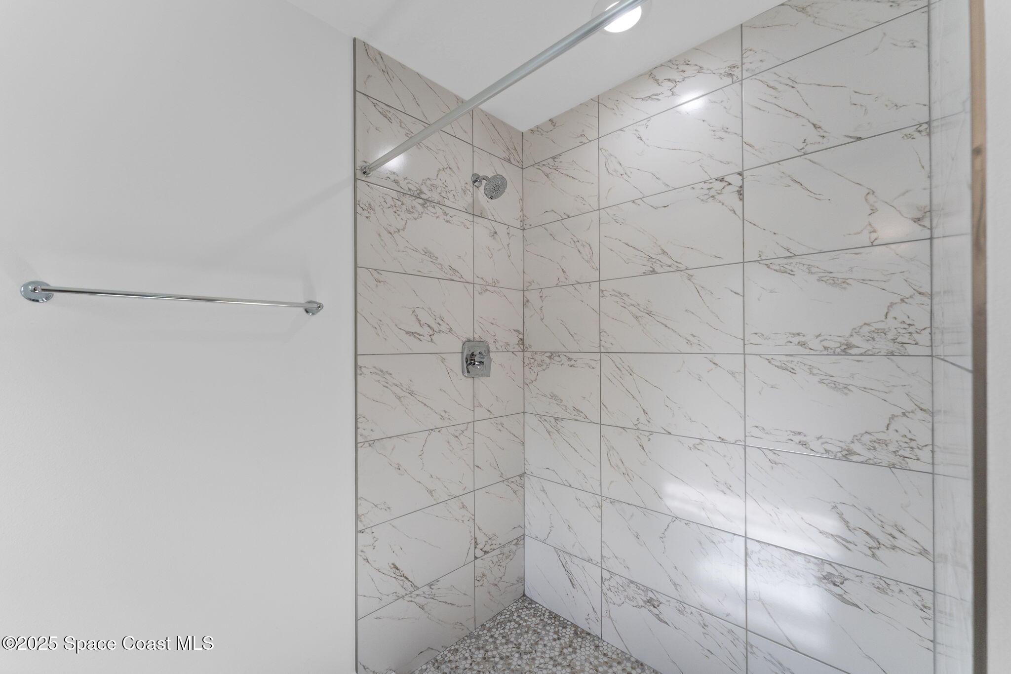 101 Crosspoint Street Southeast Palm Bay, FL 32909 - Photo 19 of 28 a bathroom with a shower