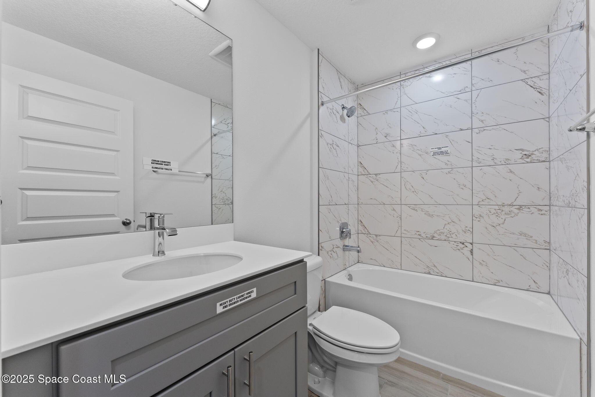 101 Crosspoint Street Southeast Palm Bay, FL 32909 - Photo 23 of 28 a bathroom with a sink a toilet and a bathtub