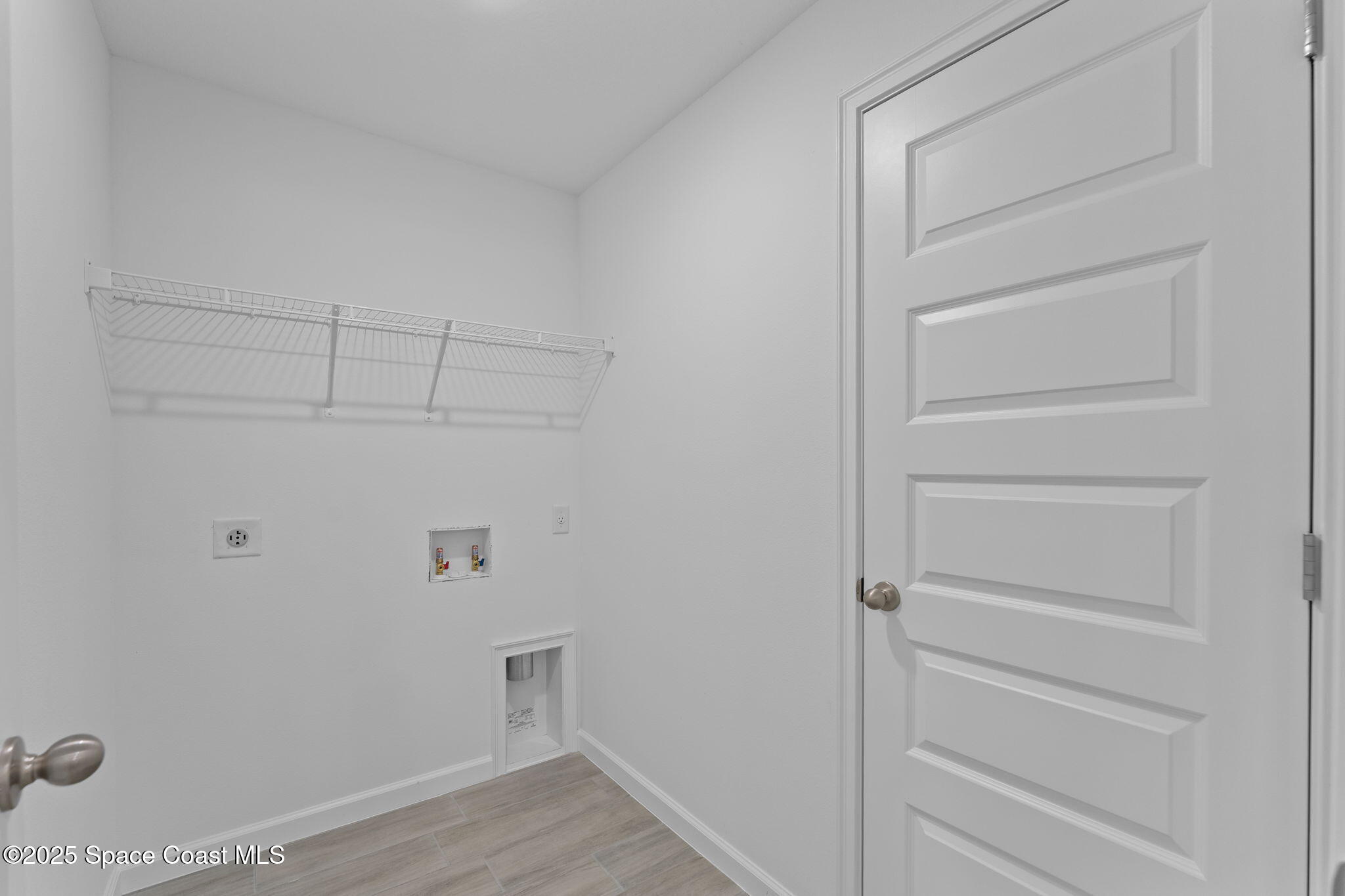 101 Crosspoint Street Southeast Palm Bay, FL 32909 - Photo 26 of 28 a view of walk in closet