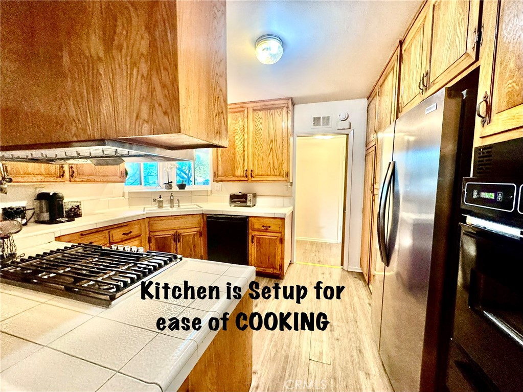 211 Benicia Road Diamond Bar, CA 91765 - Photo 12 of 36 KITCHEN SET UP FOR EASE OF COOKING.