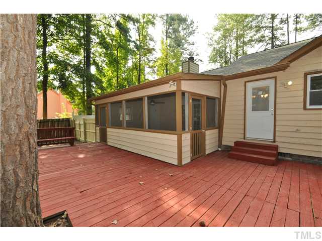 11420 Leesville Road Raleigh, NC 27613 - Photo 18 of 22 a view of wooden deck