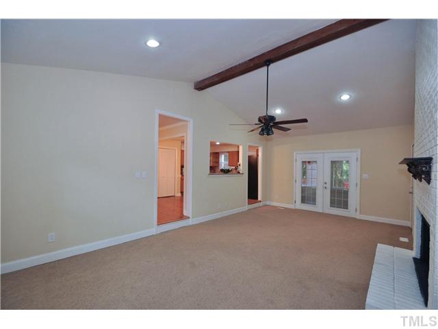 11420 Leesville Road Raleigh, NC 27613 - Photo 5 of 22 a view of a livingroom with a ceiling fan
