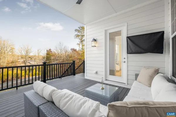 a spacious bathroom with a double vanity sink mirror and bathtub