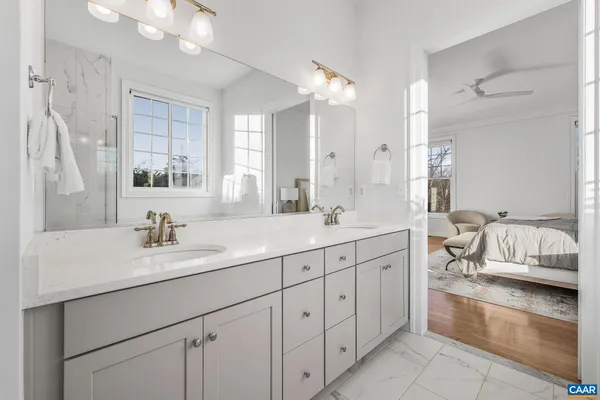 a utility room with sink dryer and washer