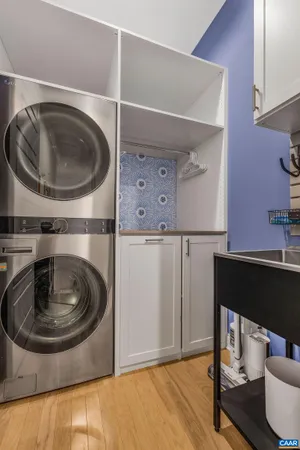 a front view of a house with a garden and yard