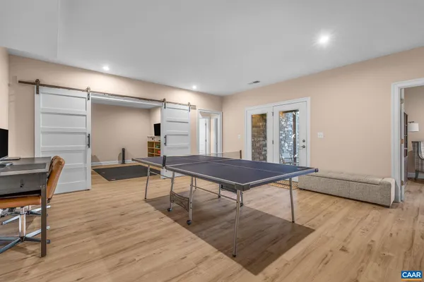 a view of a chairs and table in the balcony
