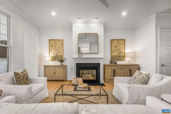 a kitchen with stainless steel appliances white cabinets and a stove