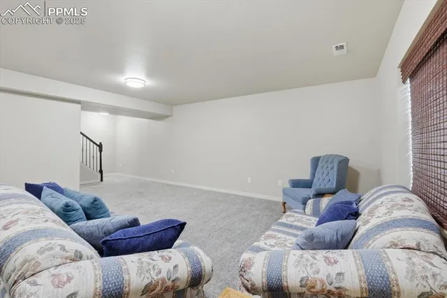 a living room with furniture and a couch